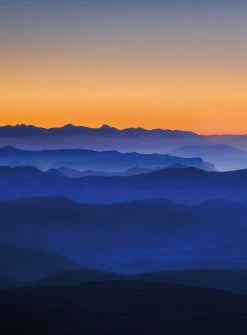 Fototapete DESIGNWALLS 2.0 - blau-orange - Berge - 2,6 Meter